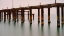 Picture of OLD PIER ON THE BEACH AND LONG EXPOSURE SEA WAVES