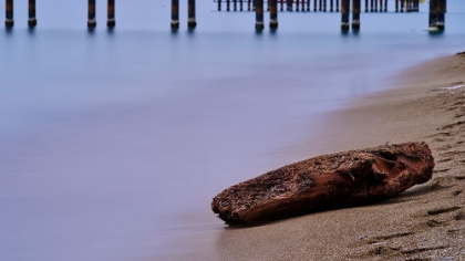 Picture of OLD PIER ON THE BEACH AND LONG EXPOSURE SEA WAVES