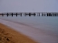 Picture of OLD PIER ON THE BEACH AND LONG EXPOSURE SEA WAVES