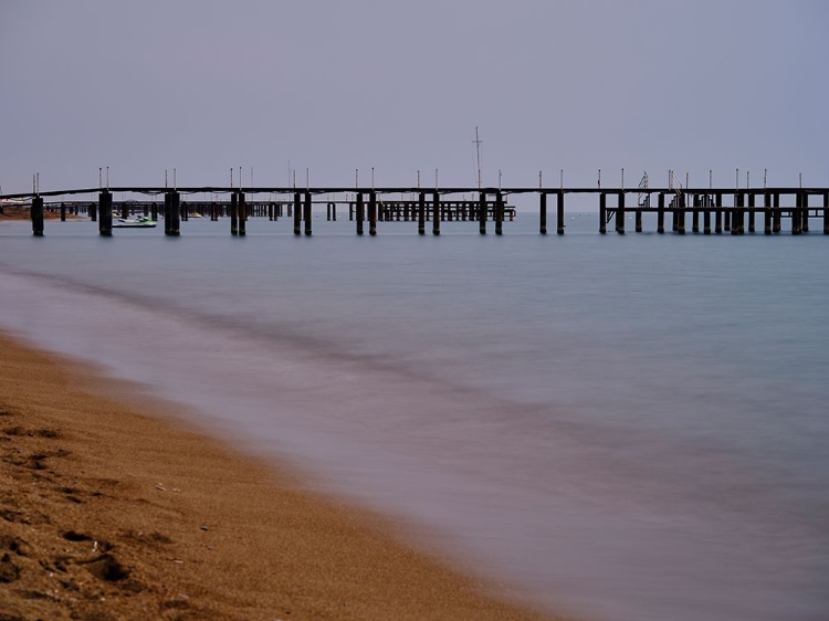 Picture of OLD PIER ON THE BEACH AND LONG EXPOSURE SEA WAVES