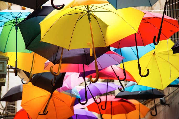 Picture of OLD BUILDING AND DECORATIVE UMBRELLAS