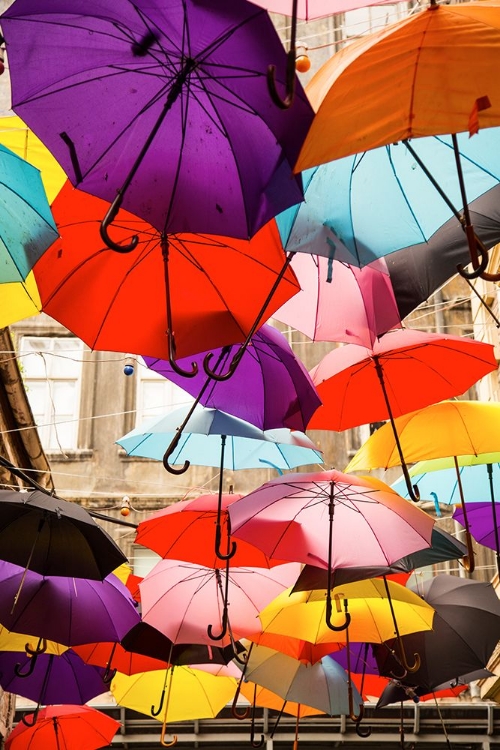 Picture of OLD BUILDING AND DECORATIVE UMBRELLAS