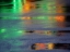 Picture of LIGHTS REFLECTED IN PUDDLES ON ASPHALT PATH