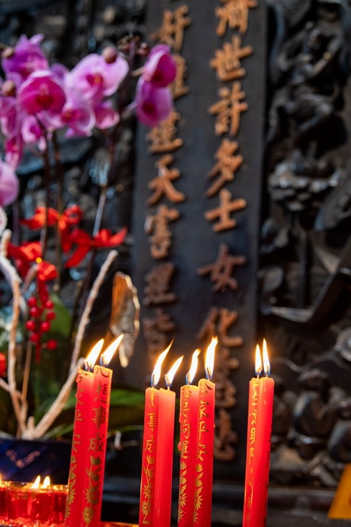 Picture of VIET NAM-AKA VIETNAM-HO CHI MINH CITY-AKA SAIGON. CHINESE TEMPLE. CANDLE OFFERINGS.