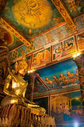 Picture of CAMBODIA. WAT PHNOM IS THE CITIES HIGHEST POINT IN PHNOM PENH. STATUES INSIDE THE TEMPLE.