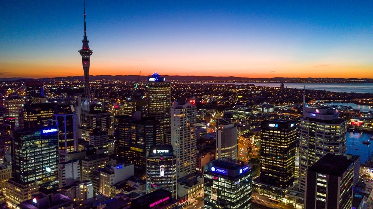 Picture of AUCKLAND-NEW ZEALAND. THE AUCKLAND SKYTOWER AND HARBOR AT NIGHT.