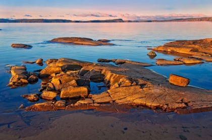 Picture of CANADA-ONTARIO-ROSSPORT. ROCKY SHORELINE OF LAKE SUPERIOR AT SUNRISE.