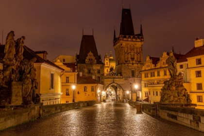 Picture of ARCH OF LESSER TOWN BRIDGE TOWER ON CHARLES BRIDGE WITH ST. NICHOLAS CHURCH IN PRAGUE.