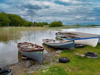 Picture of BOATS AWAIT SKIPPERS ON LOUGH CARRA-COUNTY MAYO-IRELAND. SHRINE WATCHES OVER THE FISHERMEN.