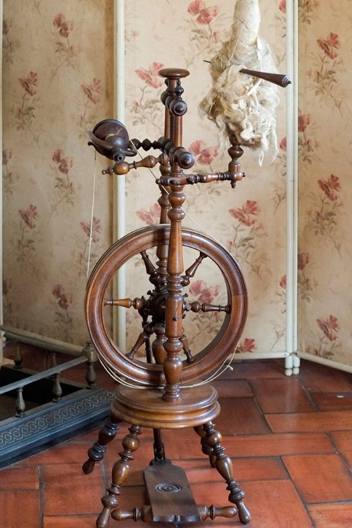Picture of SINTRA-PORTUGAL. NATIONAL PALACE INTERIOR. SPINNING WHEEL BY THE FIREPLACE (EDITORIAL USE ONLY)