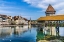 Picture of KAPELLBRUCKE OVER REUSS RIVER-LUCERNE-SWITZERLAND. BUILT IN 1365 ALMOST BURNED DOWN IN 1993.