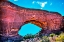 Picture of NORTH WINDOW ARCH WINDOWS SECTION ARCHES NATIONAL PARK-MOAB-UTAH. RED CANYON WALLS-BLUE SKIES.