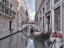 Picture of BUNCH OF ROSES ON BRIDGE OVER NARROW CANAL - VENICE - ITALY